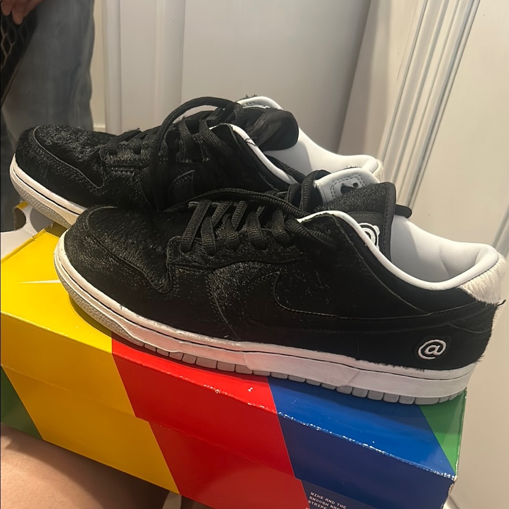 Black Low-Top Sneakers with White Accents